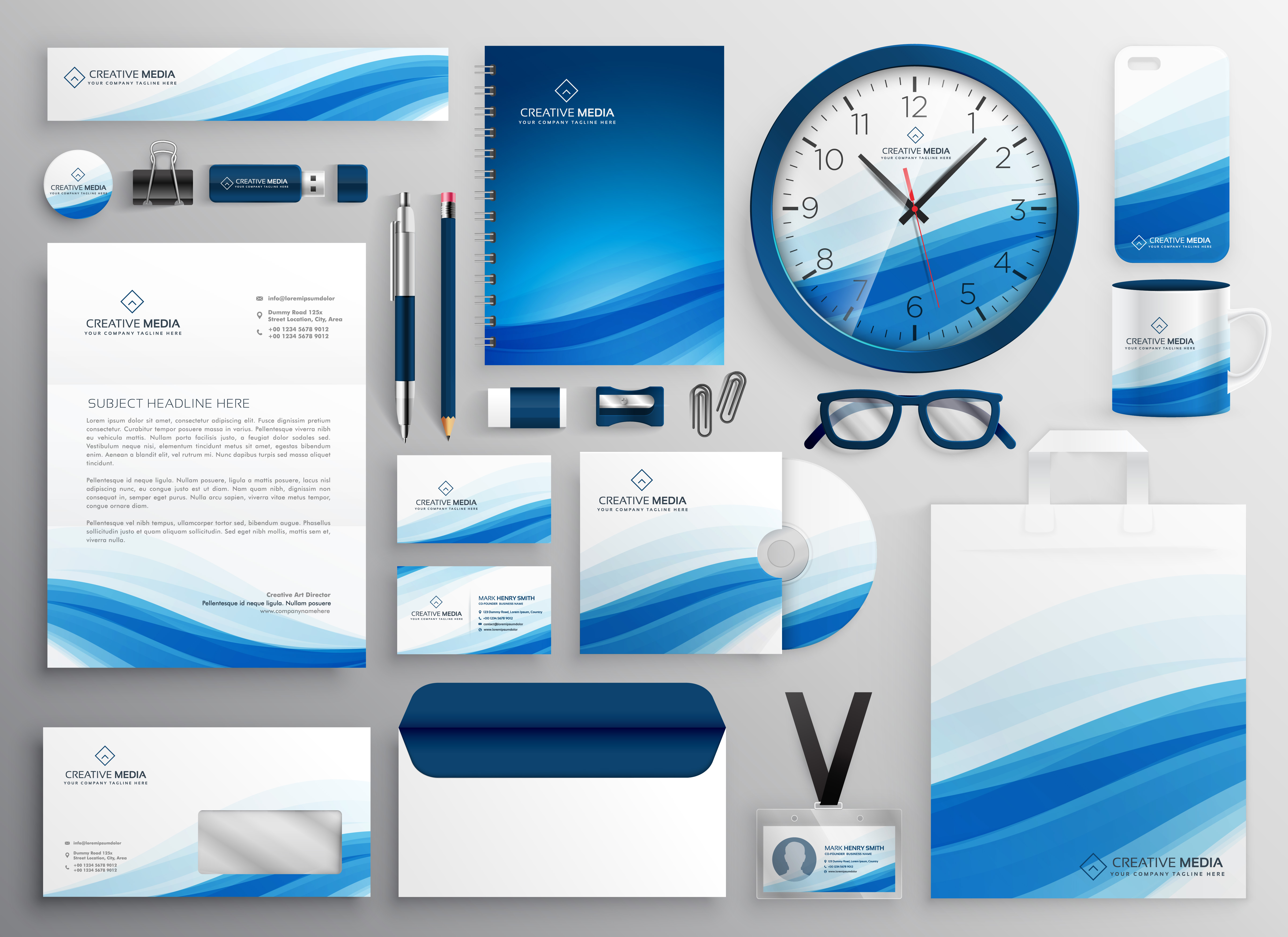 Branded stationery design including business cards, letterhead, and envelopes